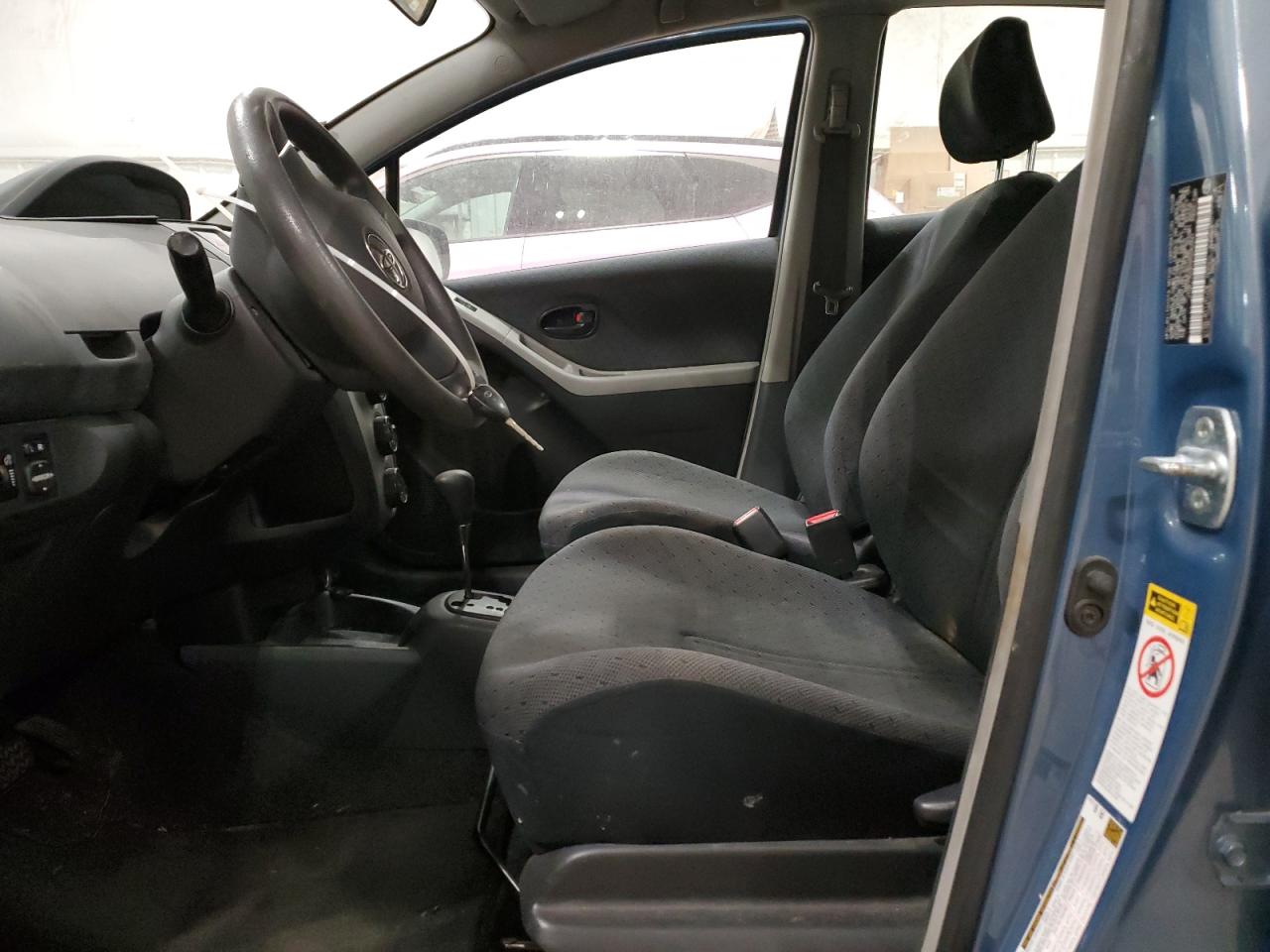 2009 Toyota Yaris VIN JTDKT903095240941 Copart auction photo, front end damage thumbnail 7