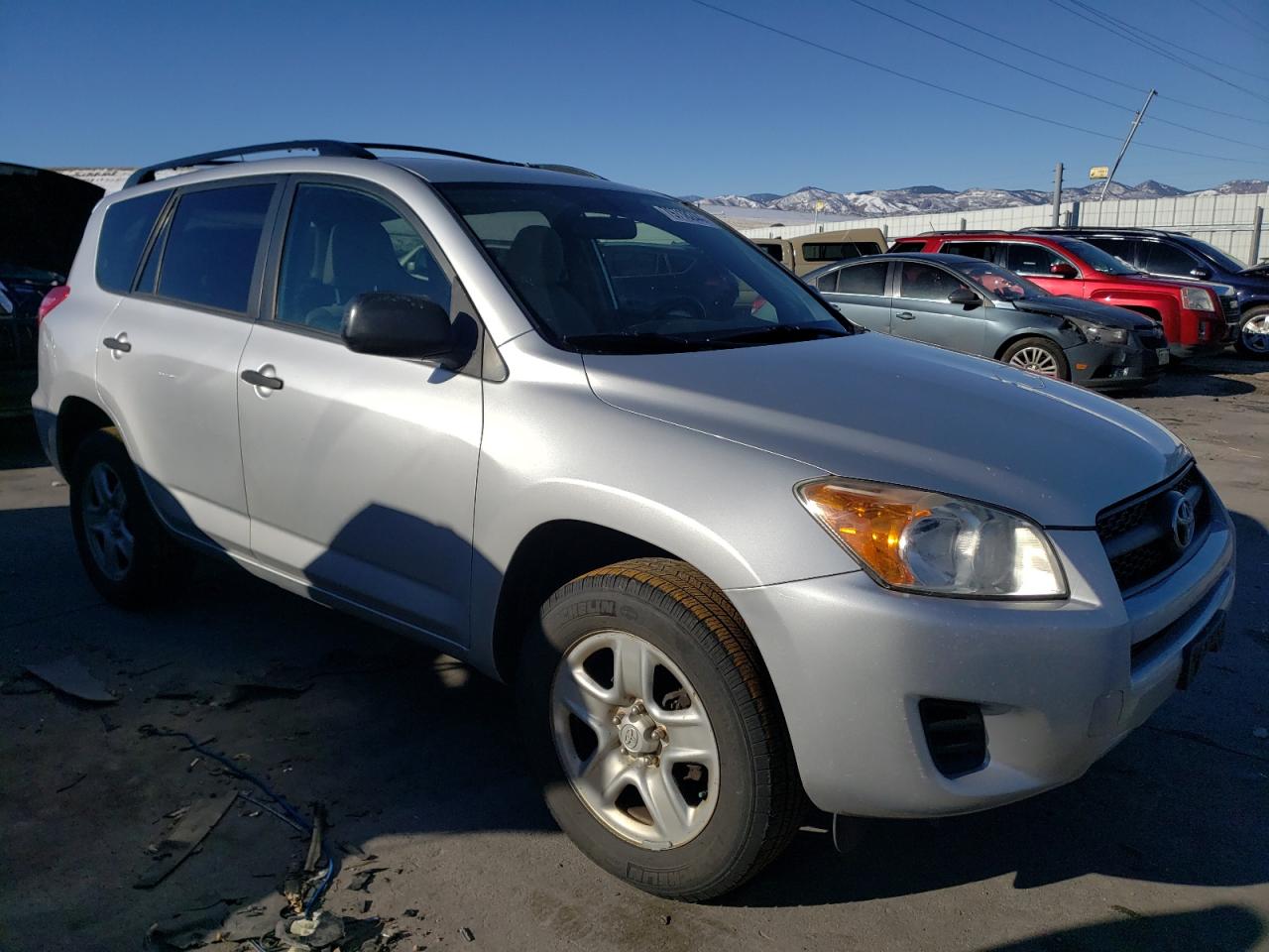 2010 Toyota RAV 4 VIN JTMBF4DV9AD038275 Copart auction photo, side / rear end damage thumbnail 4