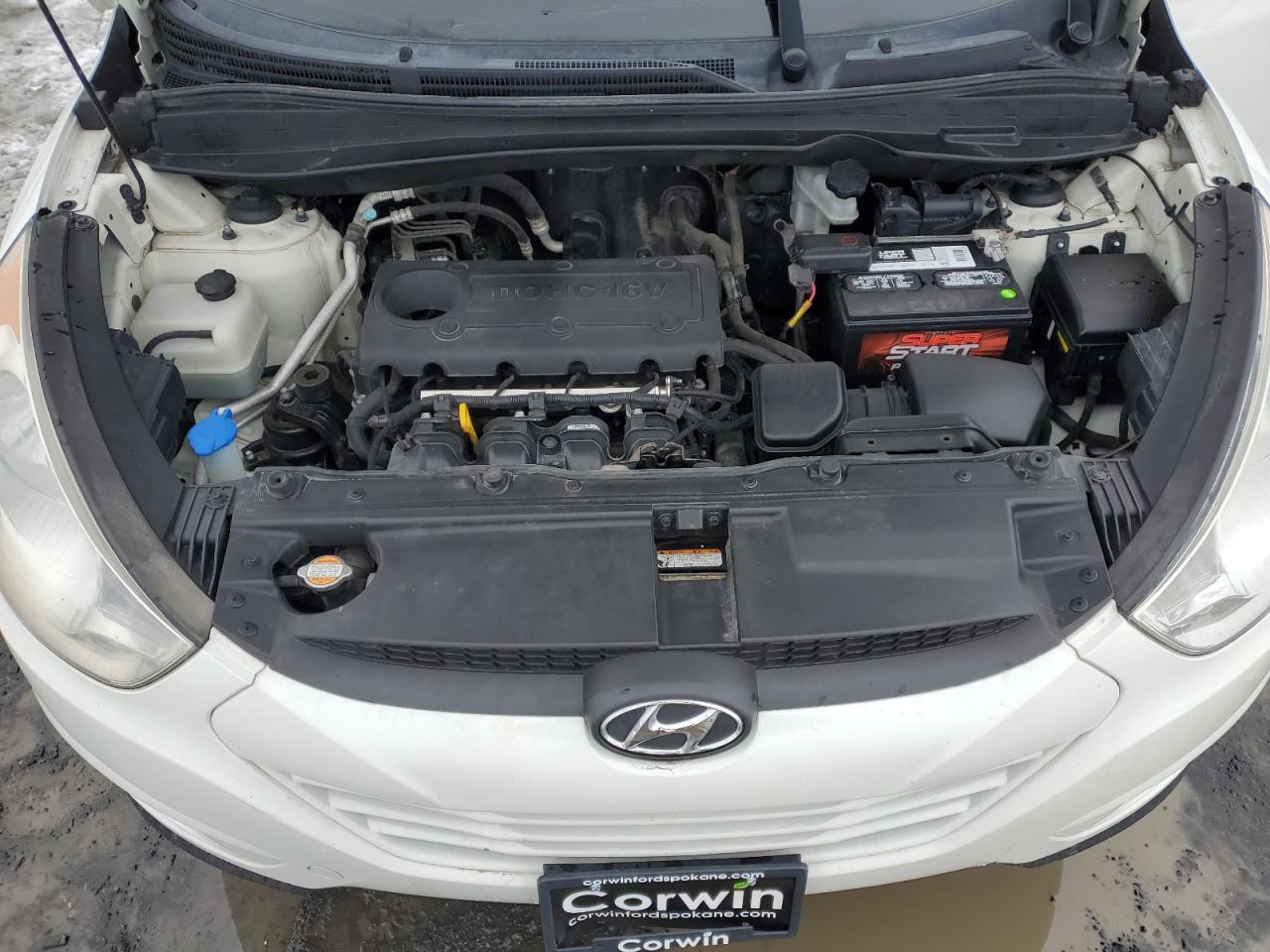 2010 Hyundai Tucson VIN KM8JUCAC9AU098406 Copart auction photo, side / front end damage thumbnail 13