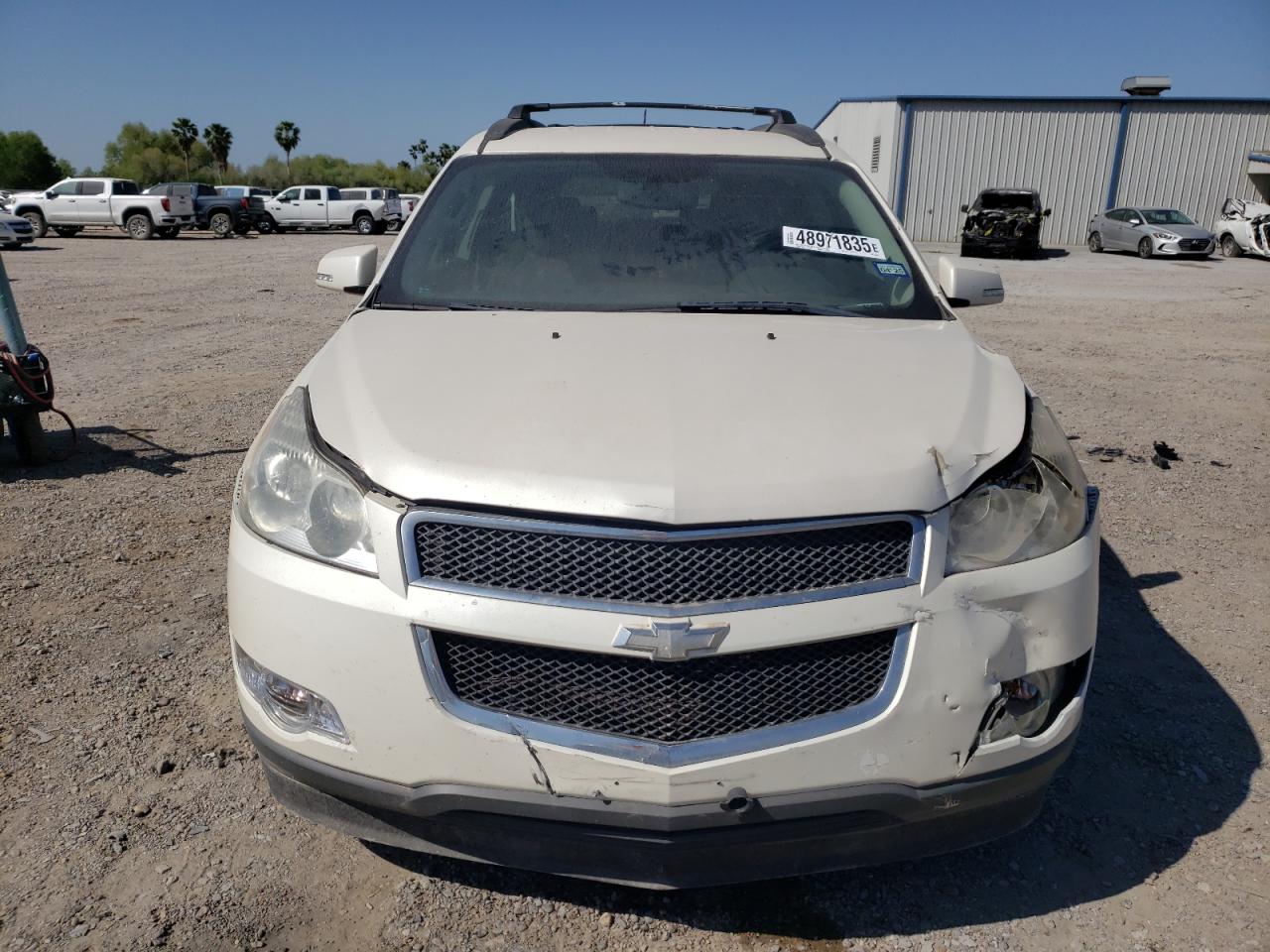 2012 Chevrolet Traverse VIN 1GNKRGED1CJ204993 Copart auction photo, front end / side damage thumbnail 5