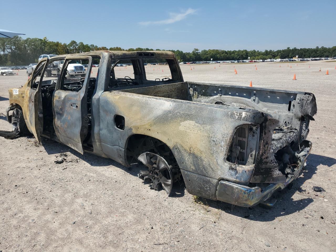 2021 RAM 1500 VIN 1C6SRFRM4MN589531 Copart auction photo, burn damage thumbnail 2