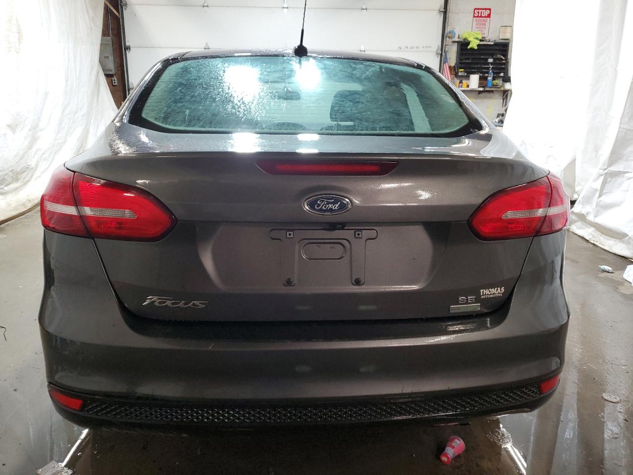 2018 Ford Focus VIN 1FADP3FE2JL256972 Copart auction photo, side / front end damage thumbnail 6