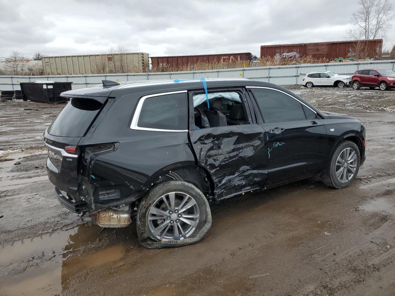 2022 Cadillac XT6 VIN 1GYKPDRS9NZ160942 Copart auction photo, side / rear end damage thumbnail 3