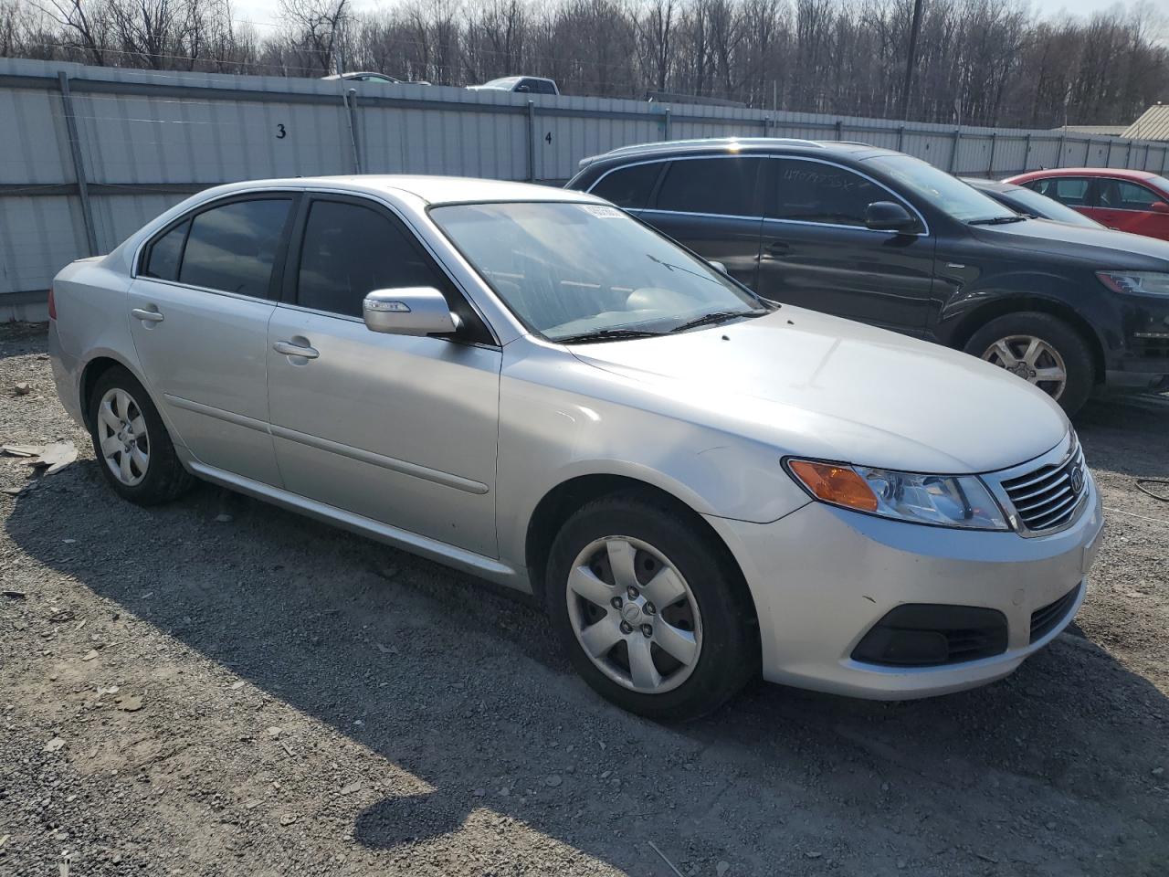2009 KIA Optima VIN KNAGE228895322851 Copart auction photo, side / minor dent/scratches damage thumbnail 4
