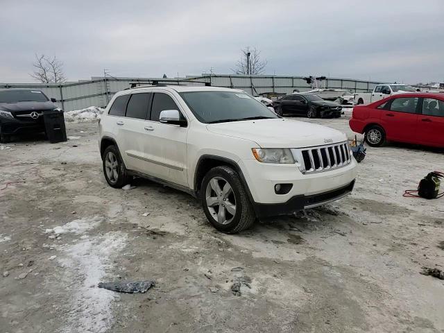 2011 Jeep Grand Cherokee VIN 1J4RR5GT1BC607286 Copart auction photo, side / minor dent/scratches damage thumbnail 11