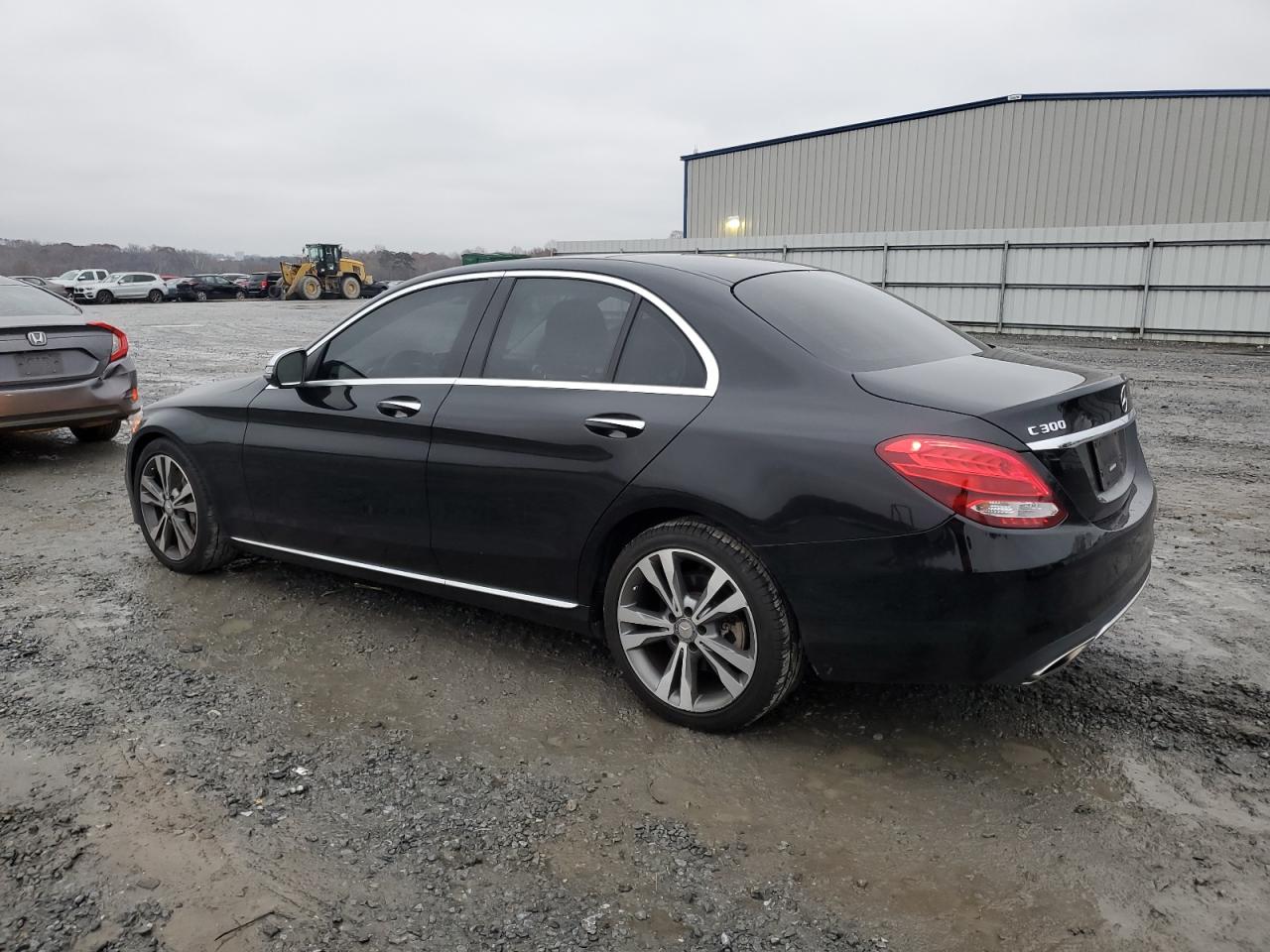 2016 Mercedes-Benz C-klasse VIN WDDWF4JB7GR154264 Copart auction photo, side / all over damage thumbnail 2