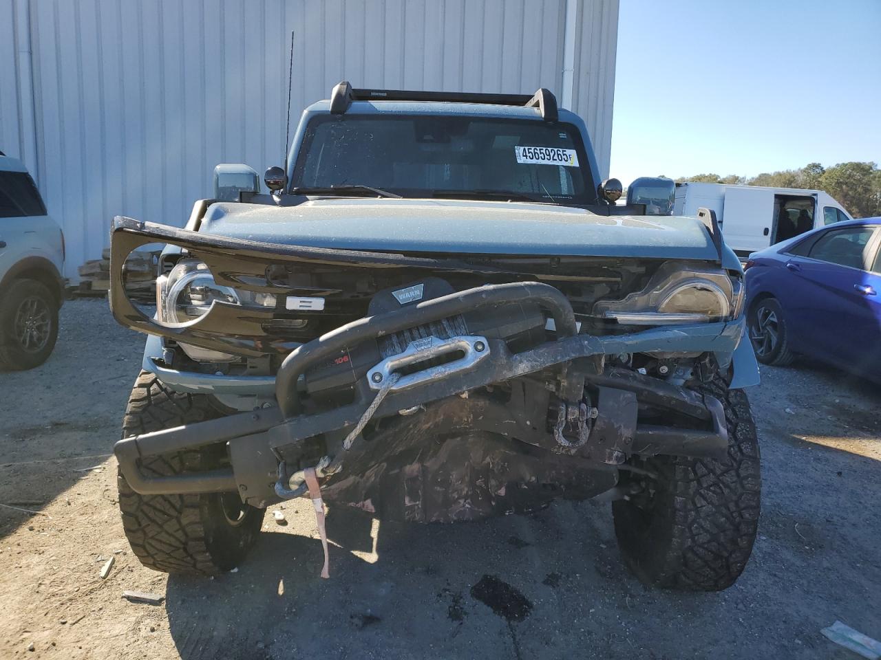 2021 Ford Bronco VIN 1FMDE5CPXMLA63292 Copart auction photo, front end damage thumbnail 5