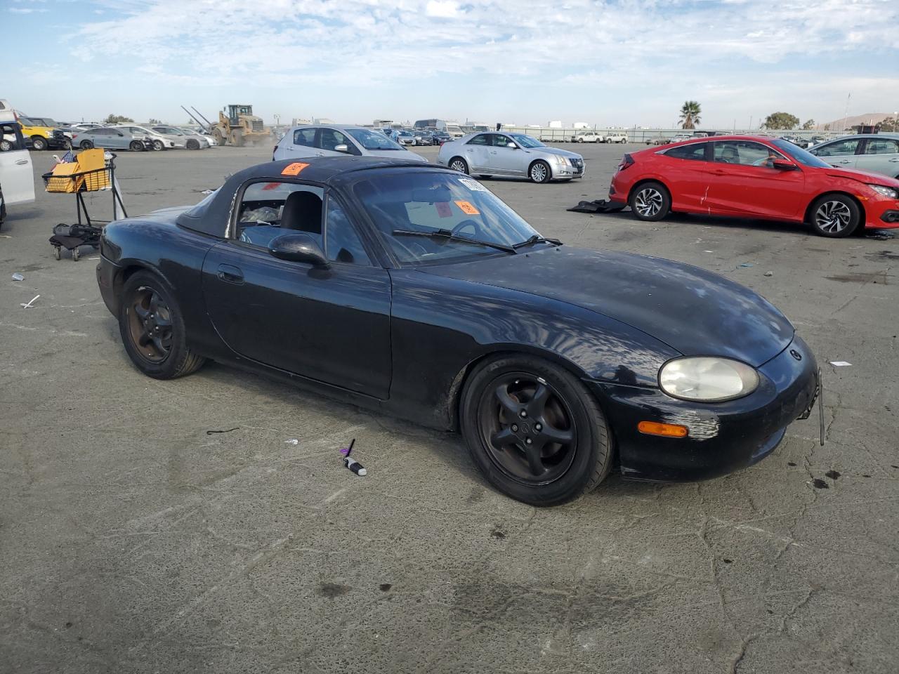 1999 Mazda MX-5 VIN JM1NB3537X0110784 Copart auction photo, vandalism damage thumbnail 4