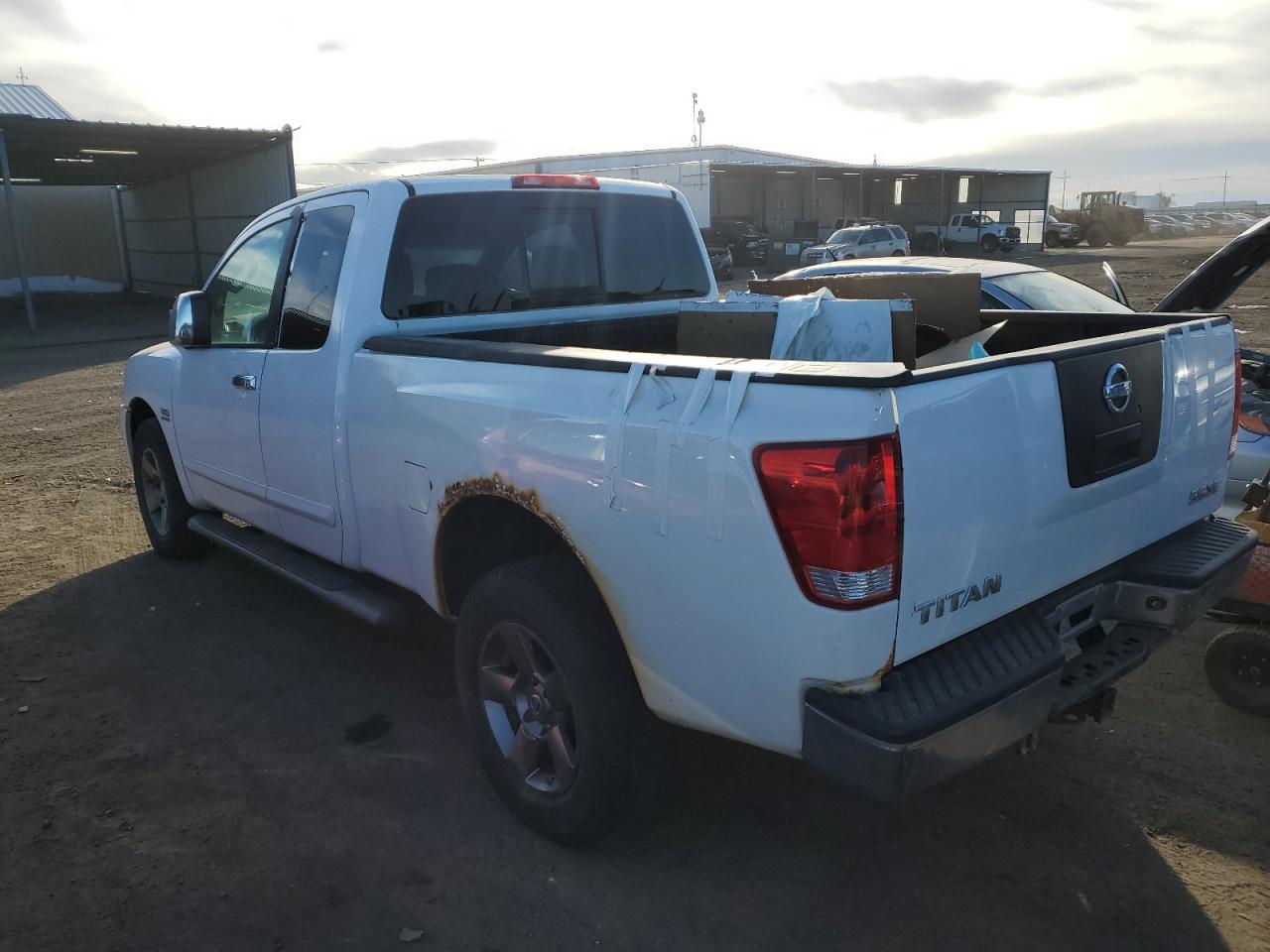 2004 Nissan Titan VIN 1N6AA06B64N554188 Copart auction photo, vandalism damage thumbnail 2