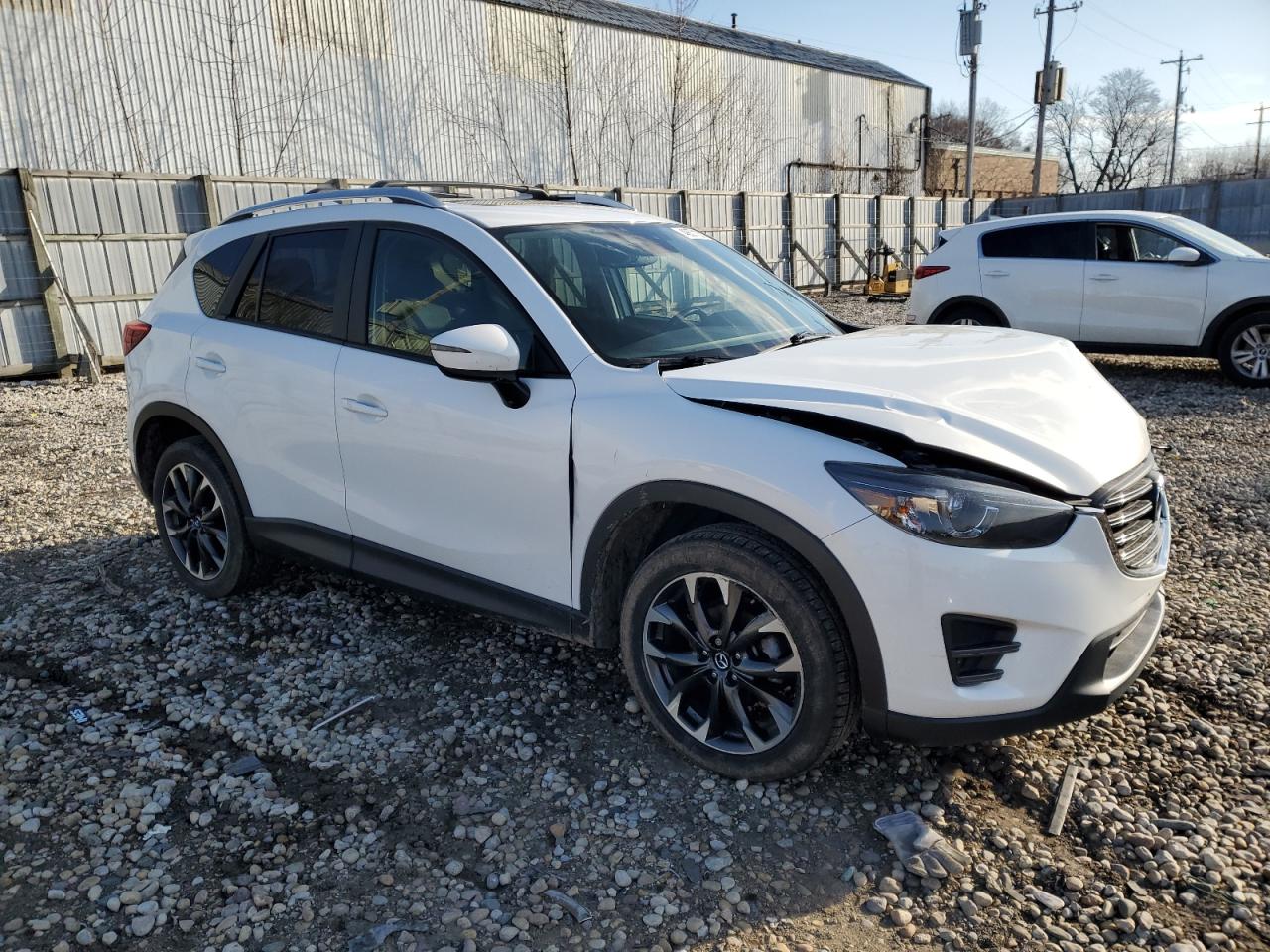 2016 Mazda CX-5 VIN JM3KE4DY1G0858211 Copart auction photo, front end damage thumbnail 4