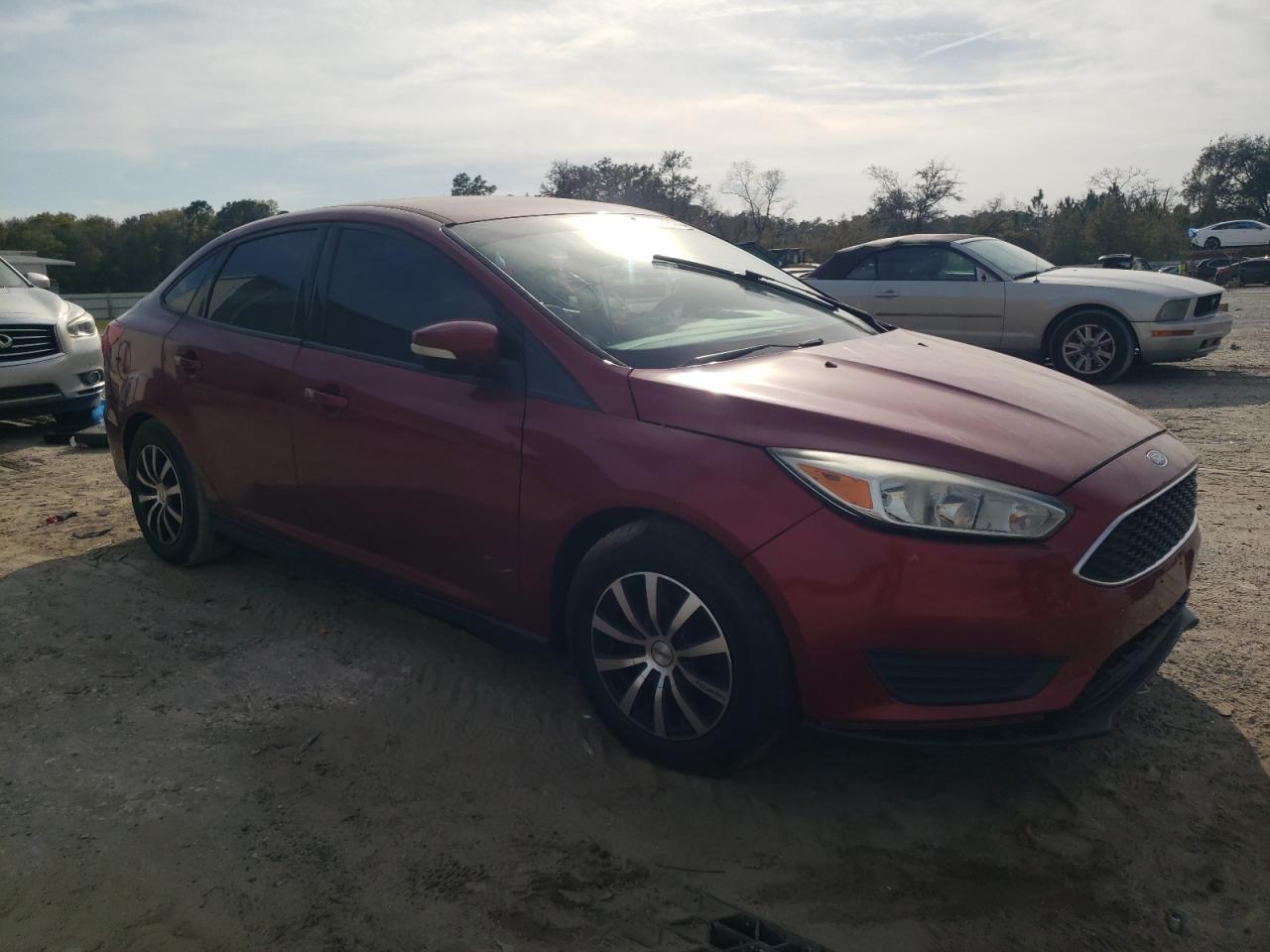 2015 Ford Focus VIN 1FADP3F24FL253584 Copart auction photo, side / front end damage thumbnail 4