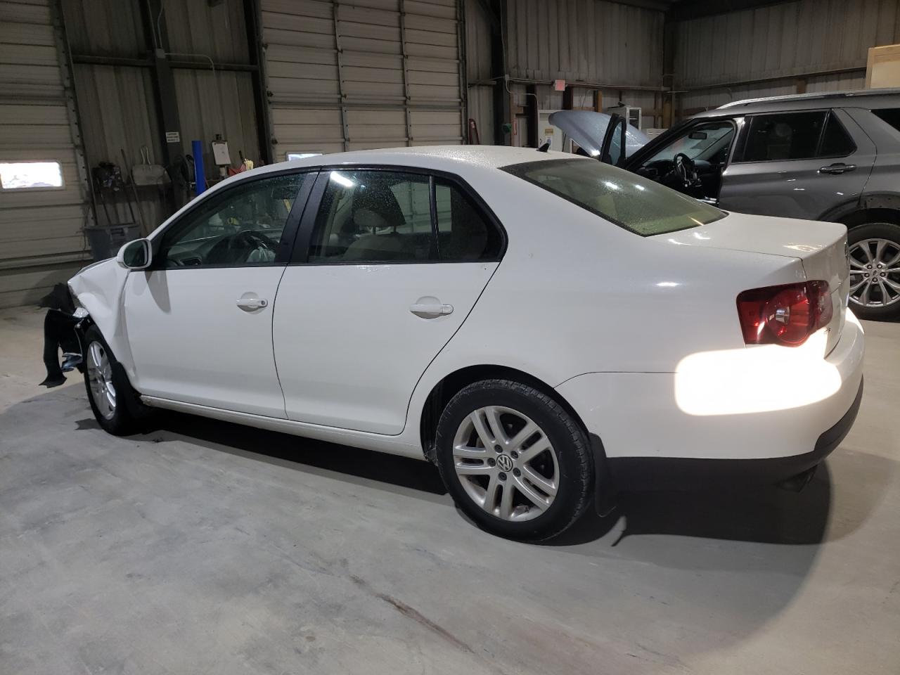 2009 Volkswagen Jetta VIN 3VWJM71K49M043345 Copart auction photo, front end / hail damage thumbnail 2