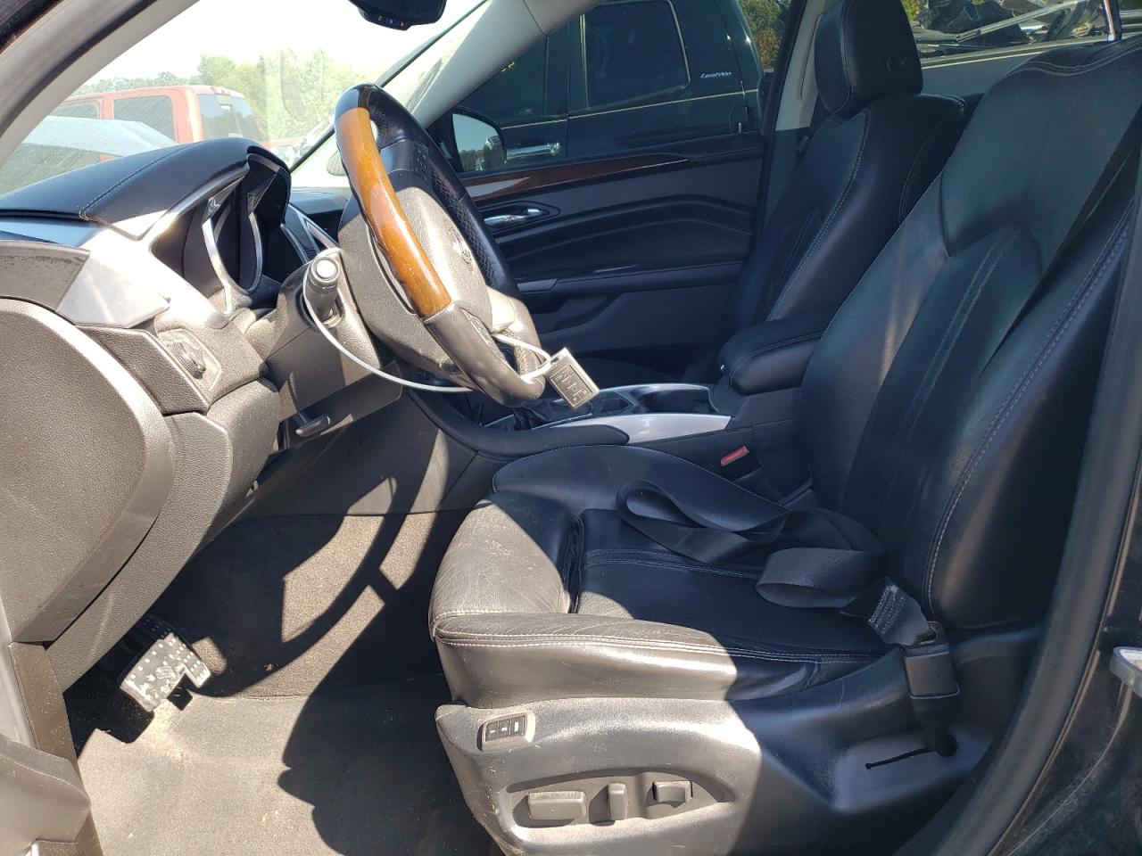 2012 Cadillac SRX VIN 3GYFNCE34CS573653 Copart auction photo, front end damage thumbnail 7