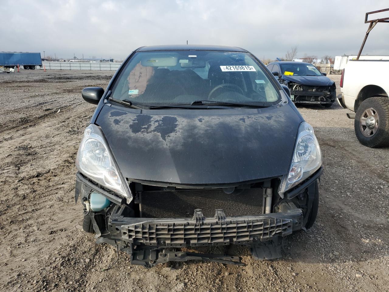 2010 Honda Fit VIN JHMGE8H47AS016898 Copart auction photo, front end / rear end damage thumbnail 5