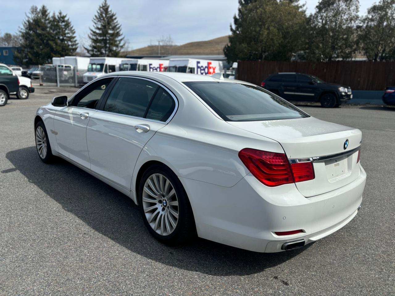 2012 BMW 7er VIN WBAKC8C58CC436987 Copart auction photo, normal wear damage thumbnail 3