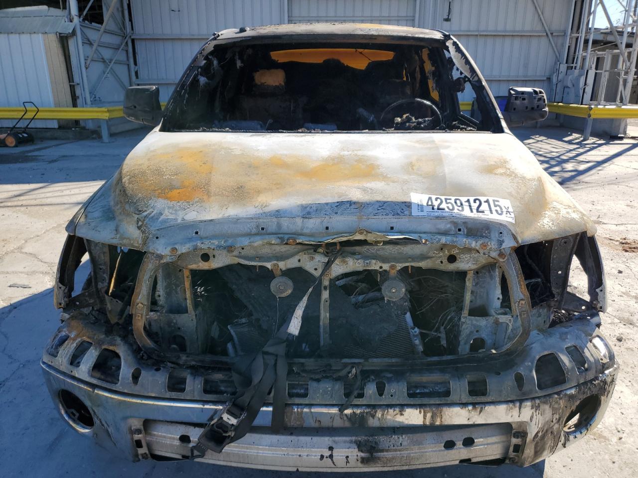 2012 Toyota Tundra VIN 5TFEM5F1XCX043702 Copart auction photo, burn damage thumbnail 12