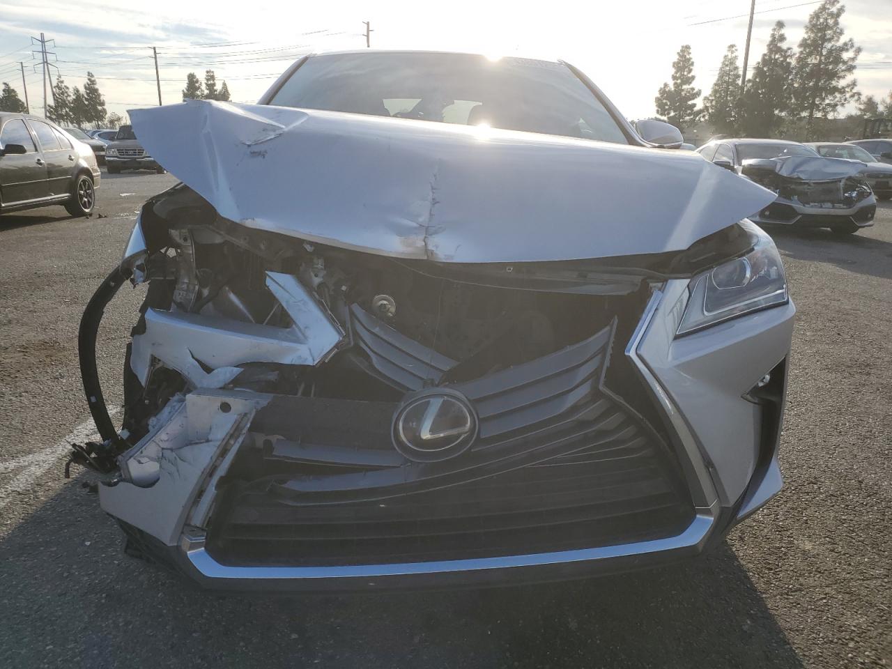 2019 Lexus RX VIN 2T2ZZMCA3KC124616 Copart auction photo, front end / side damage thumbnail 5