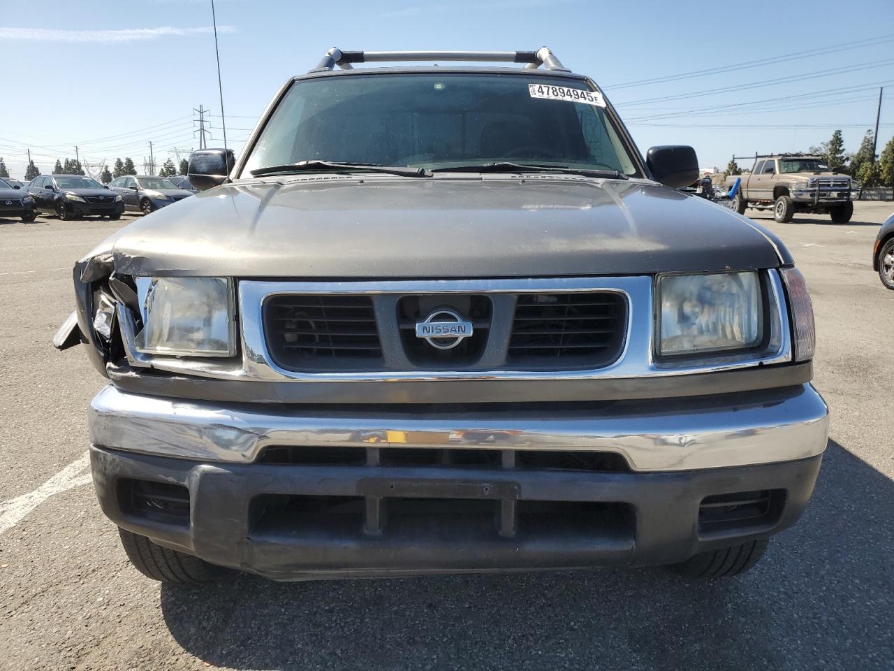 2000 Nissan Navara (Frontier) VIN 1N6ED27T8YC431554 Copart auction photo, front end / side damage thumbnail 5