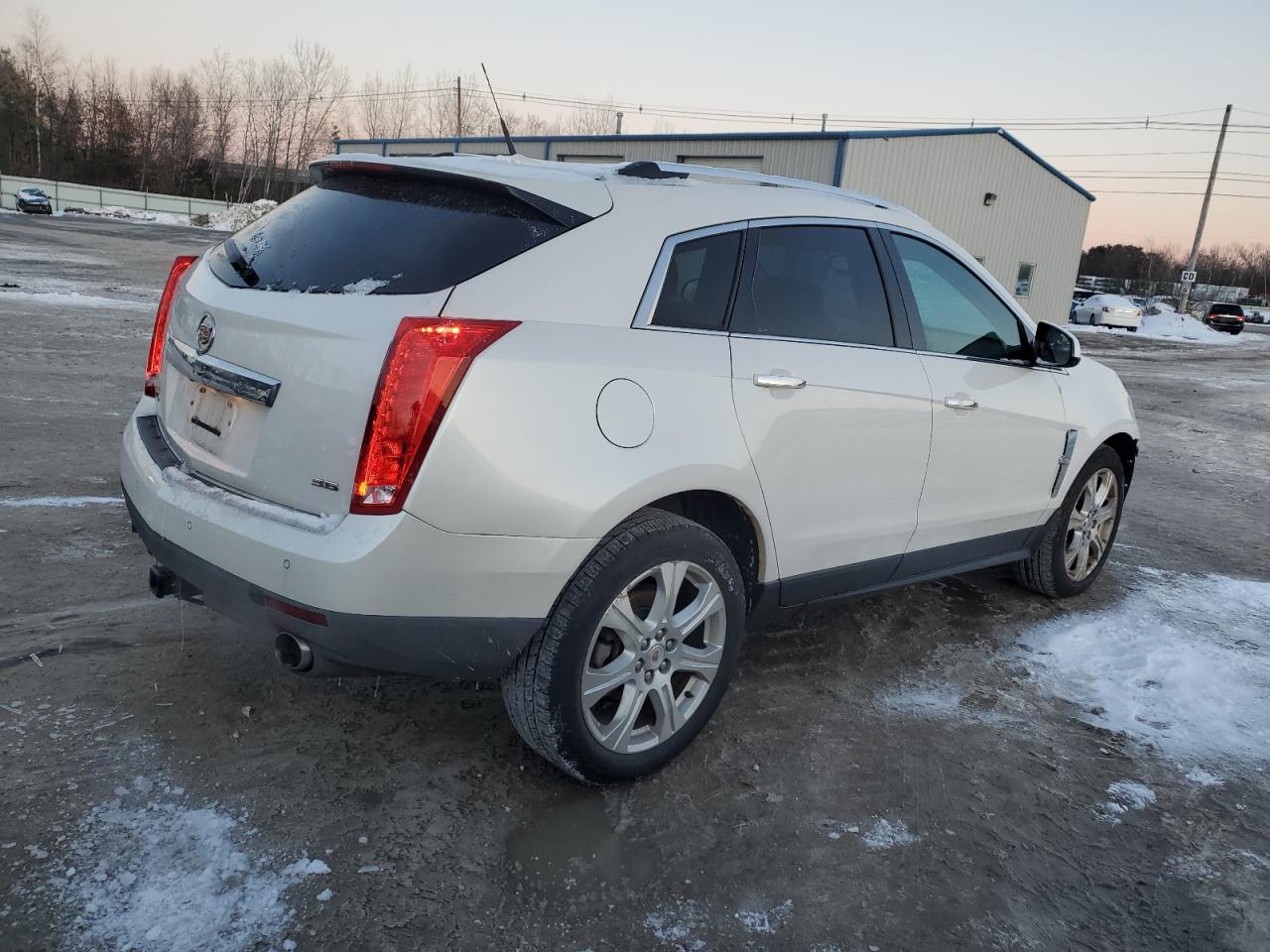 2012 Cadillac SRX VIN 3GYFNEE31CS557423 Copart auction photo, front end damage thumbnail 3