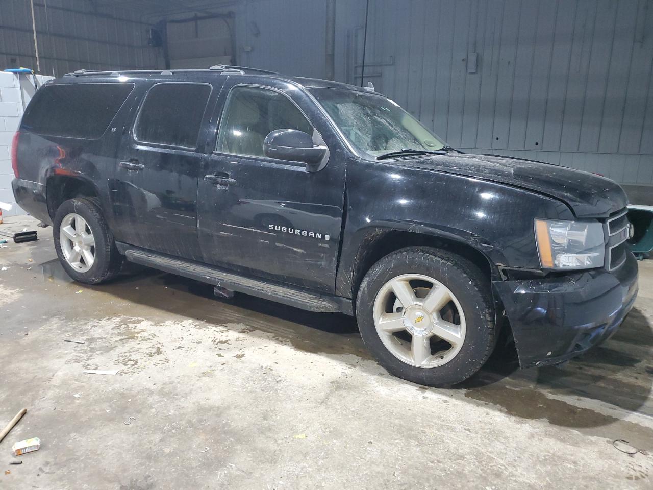 2009 Chevrolet Suburban VIN 1GNFK26339J125767 Copart auction photo, front end / minor dent/scratches damage thumbnail 4