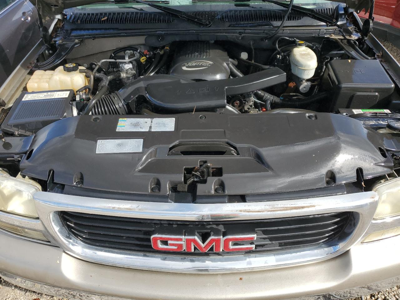 2003 GMC Yukon VIN 1GKEC16T43J144089 Copart auction photo, water/flood damage thumbnail 12