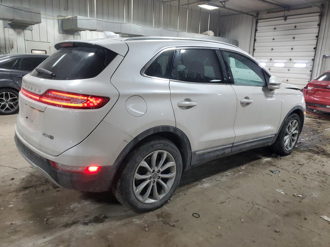 2015 Lincoln MKZ VIN 5LMCJ2A93FUJ05872 Copart auction photo, front end / side damage thumbnail 3