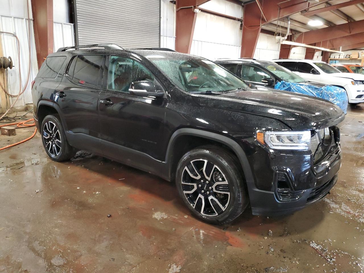 2021 GMC Acadia VIN 1GKKNKLA9MZ157025 Copart auction photo, front end / side damage thumbnail 4