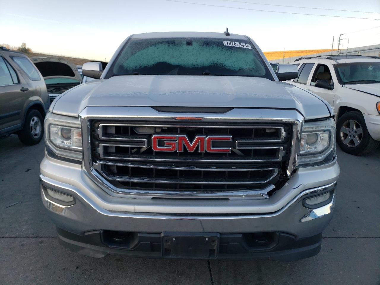 2016 GMC Sierra VIN 1GTV2MECXGZ134577 Copart auction photo, front end / side damage thumbnail 5