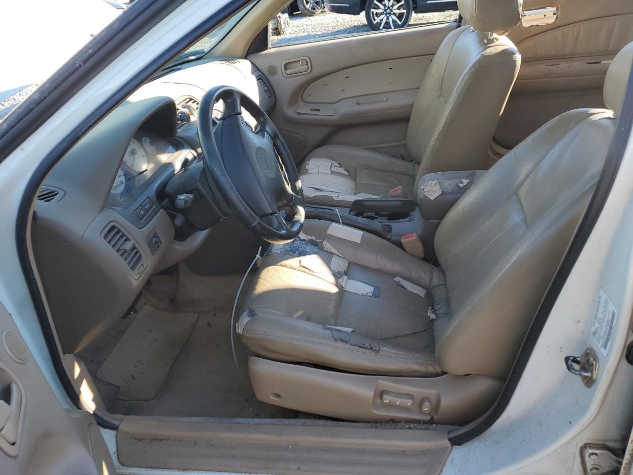 1999 Nissan Maxima VIN JN1CA21DXXM402802 Copart auction photo, all over damage thumbnail 7