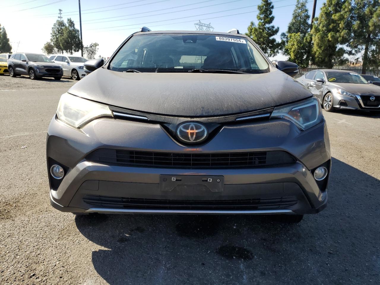 2017 Toyota RAV 4 VIN 2T3WFREV8HW342336 Copart auction photo, side damage thumbnail 5
