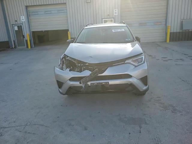 2017 Toyota RAV 4 VIN 2T3BFREV8HW582453 Copart auction photo, front end / side damage thumbnail 14