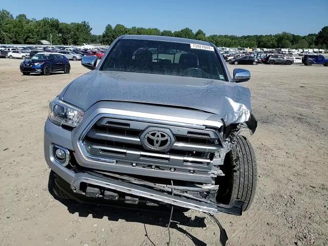 2017 Toyota Tacoma VIN 5TFEZ5CN9HX036496 Copart auction photo, front end / minor dent/scratches damage thumbnail 11