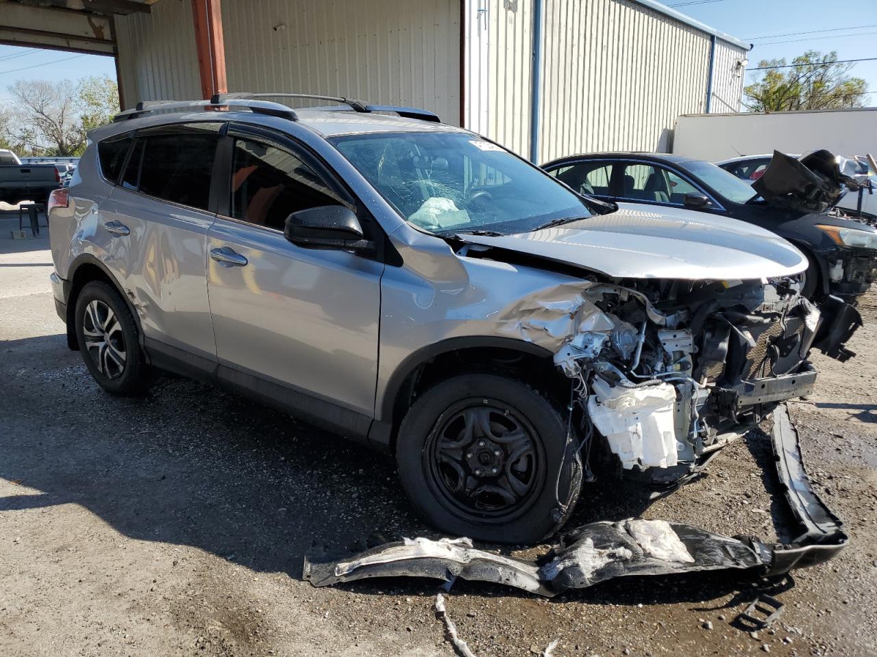 2016 Toyota RAV 4 VIN 2T3BFREV1GW482970 Copart auction photo, front end / side damage thumbnail 4