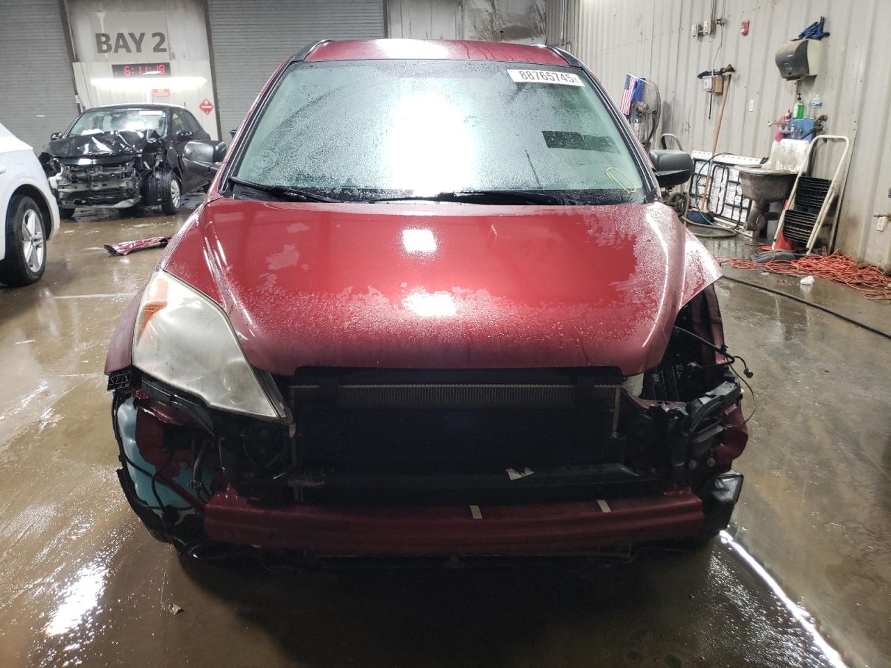 2009 Honda CR-V VIN 5J6RE48339L056485 Copart auction photo, front end / minor dent/scratches damage thumbnail 5