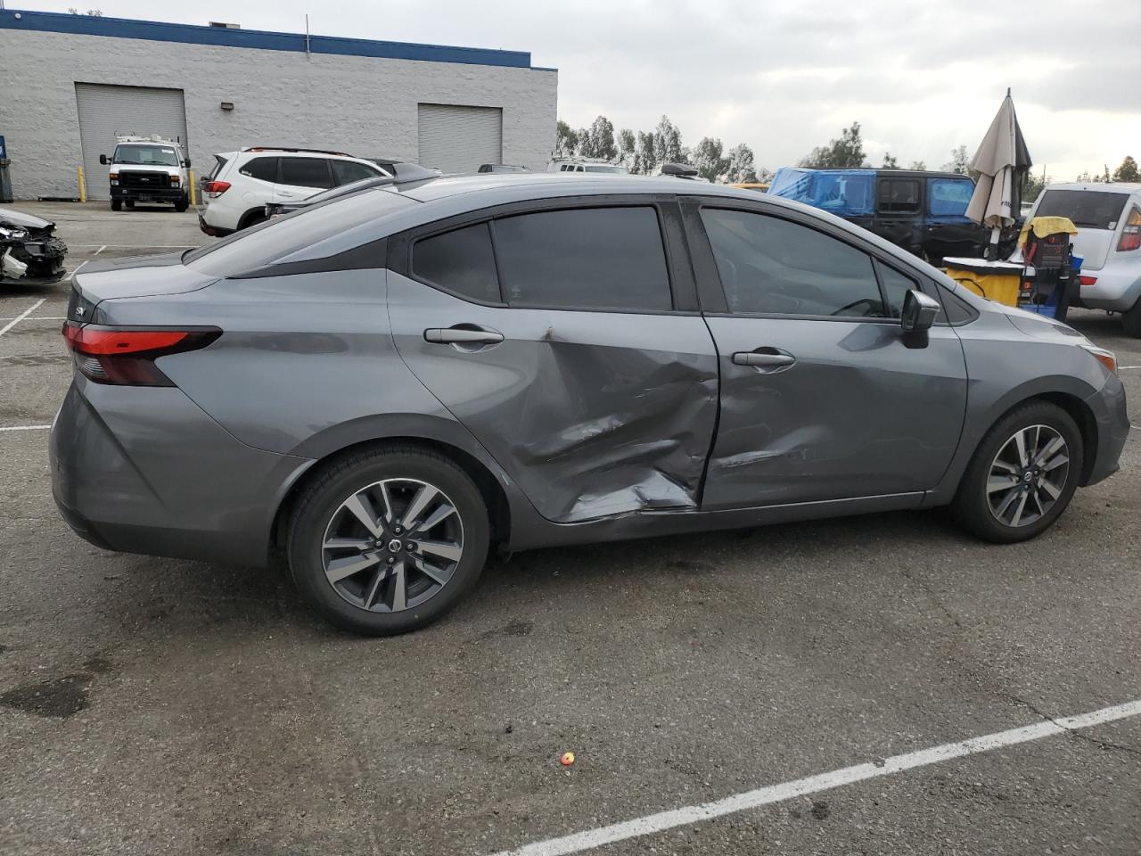 2021 Nissan Versa VIN 3N1CN8EVXML892092 Copart auction photo, side damage thumbnail 3