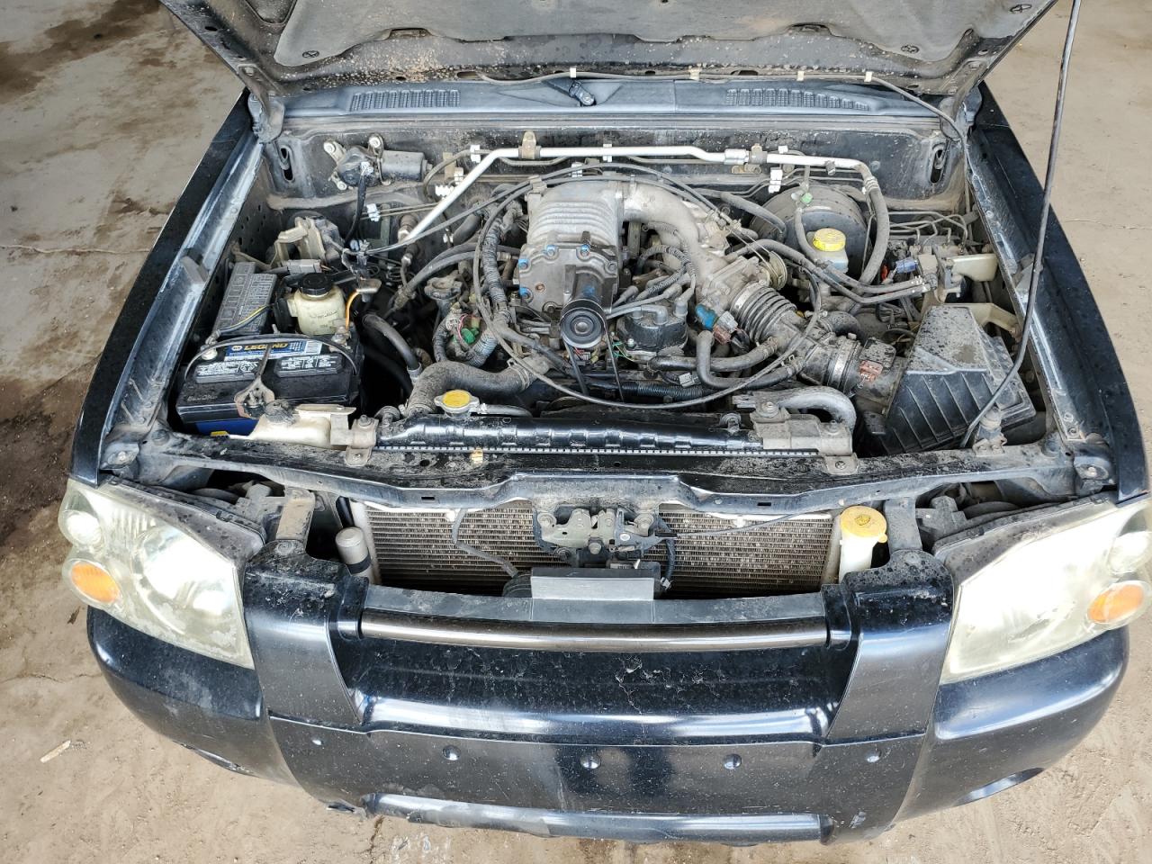 2003 Nissan Navara (Frontier) VIN 1N6MD29Y13C412289 Copart auction photo, front end damage thumbnail 11