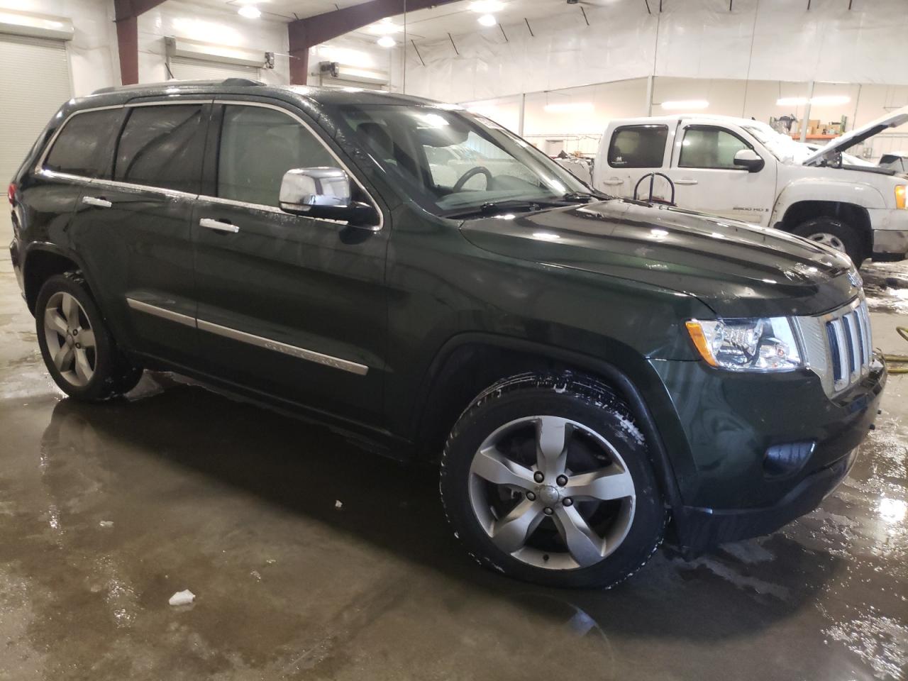2011 Jeep Grand Cherokee VIN 1J4RR5GG7BC655216 Copart auction photo, front end / undercarriage damage thumbnail 4