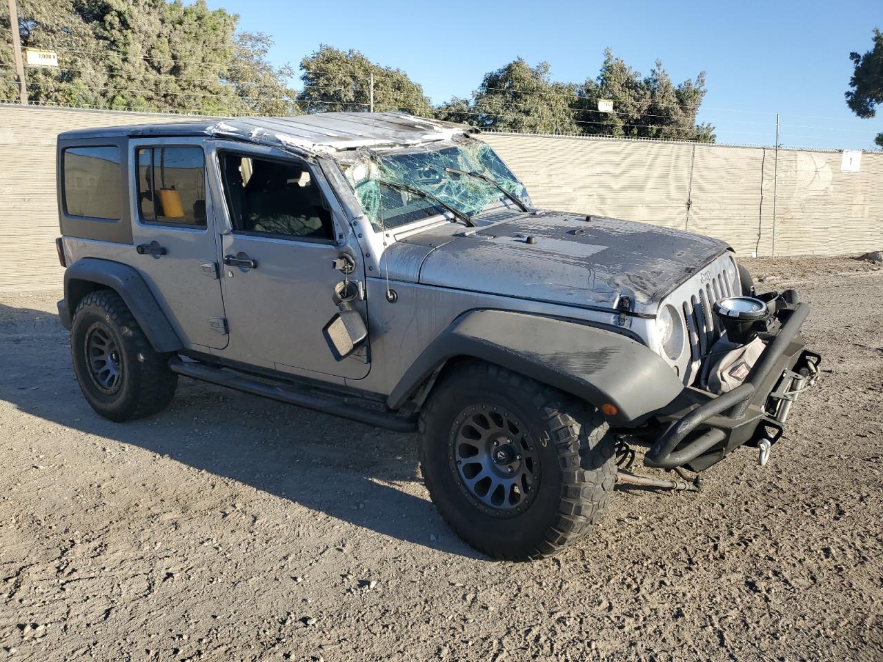 2016 Jeep Wrangler VIN 1C4HJWDG2GL109031 Copart auction photo, rollover damage thumbnail 4