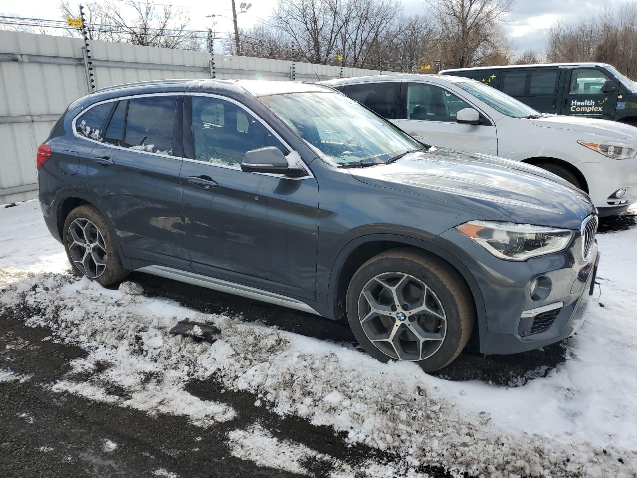 2018 BMW X1 VIN WBXHT3C38J5L29456 Copart auction photo, front end damage thumbnail 4