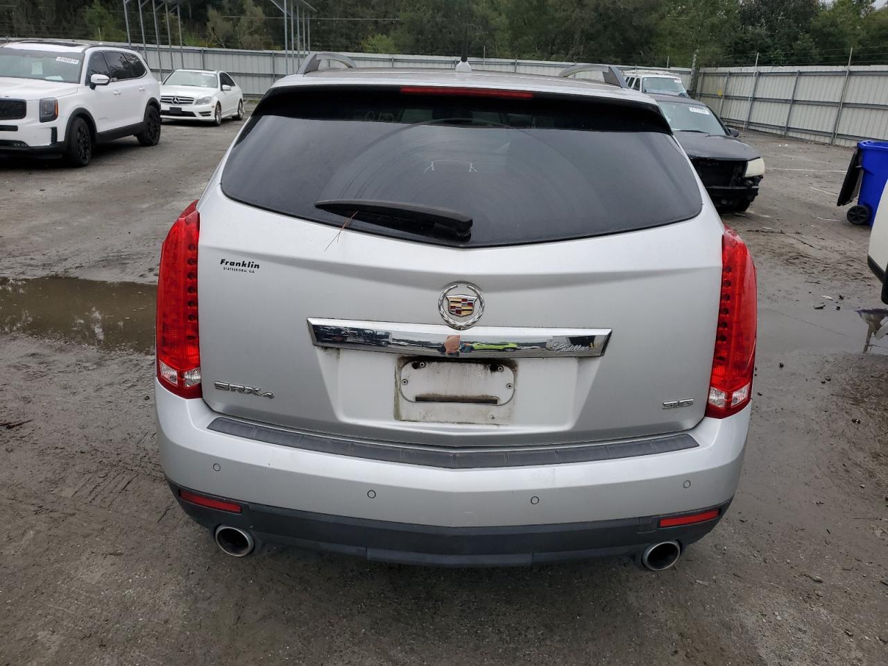 2012 Cadillac SRX VIN 3GYFNDE37CS560790 Copart auction photo, front end damage thumbnail 6