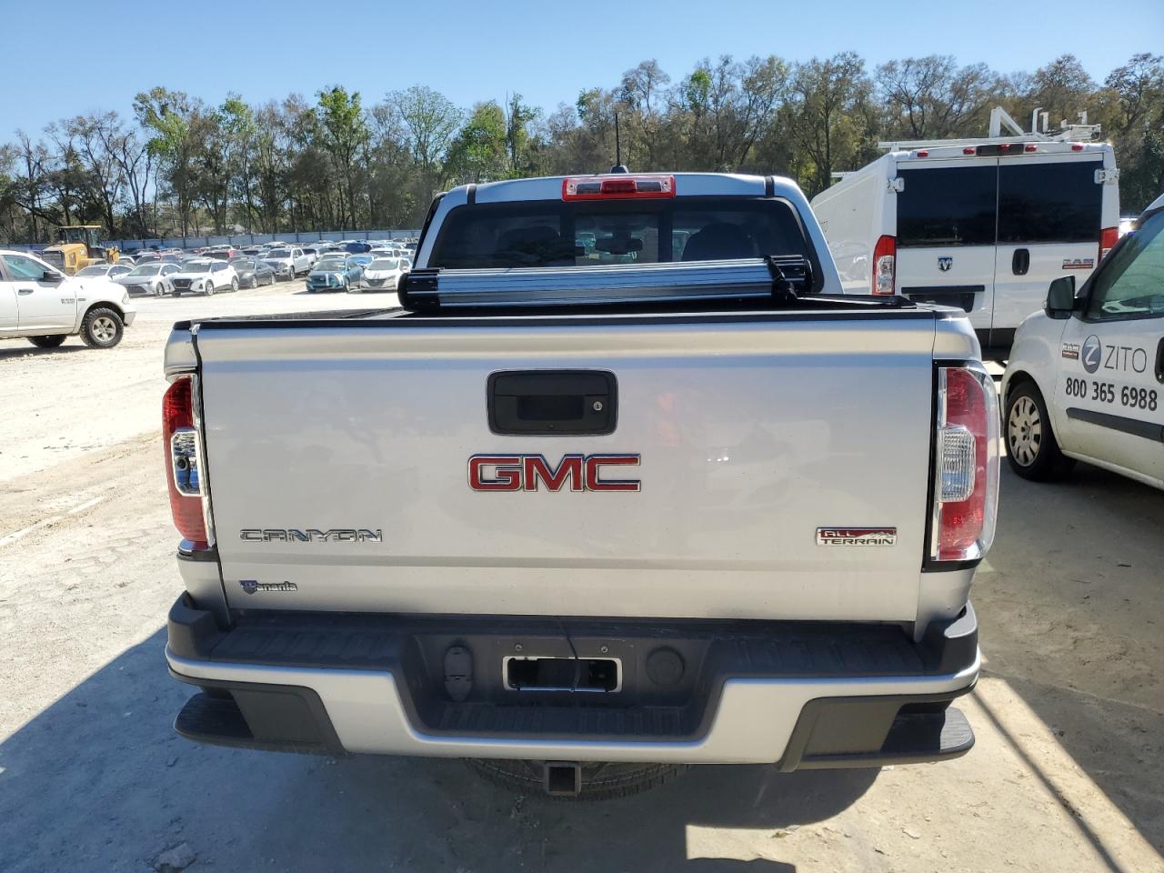 2016 GMC Canyon VIN 1GTG6CE36G1354255 Copart auction photo, side / rear end damage thumbnail 6