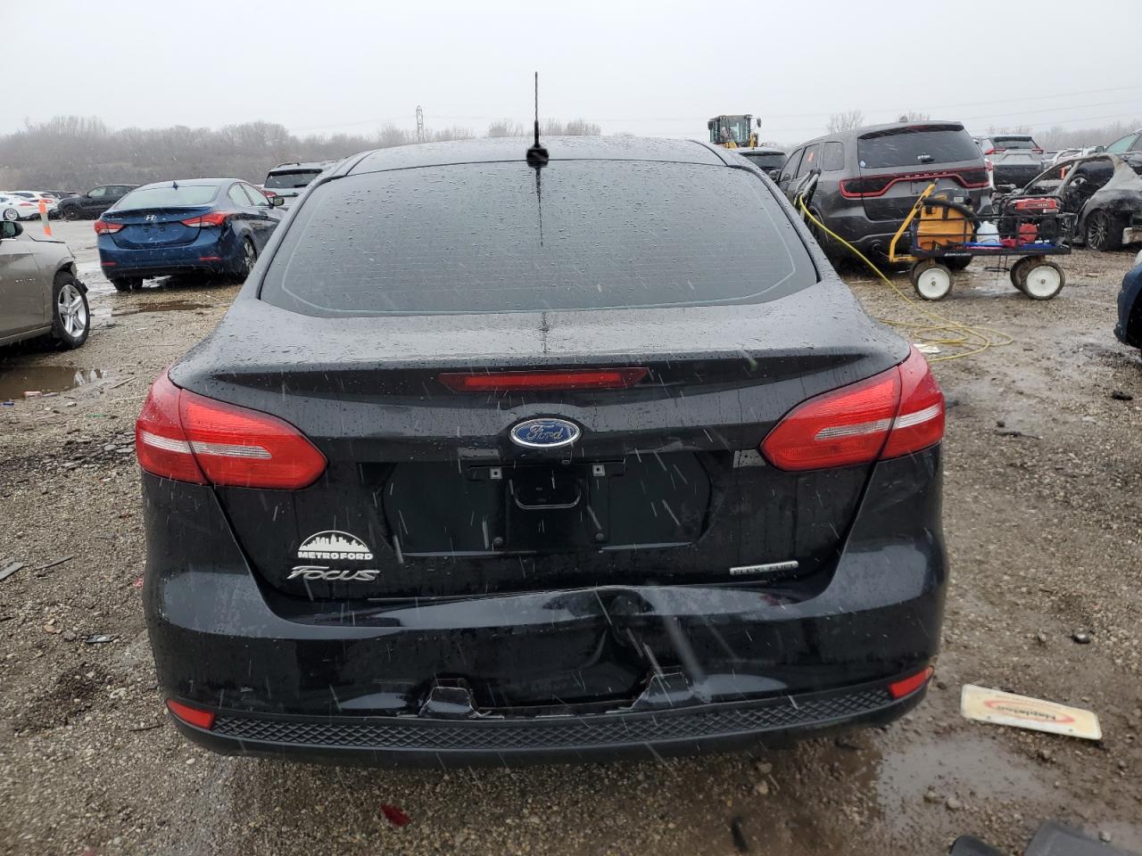 2016 Ford Focus VIN 1FADP3E22GL231229 Copart auction photo, side / front end damage thumbnail 6