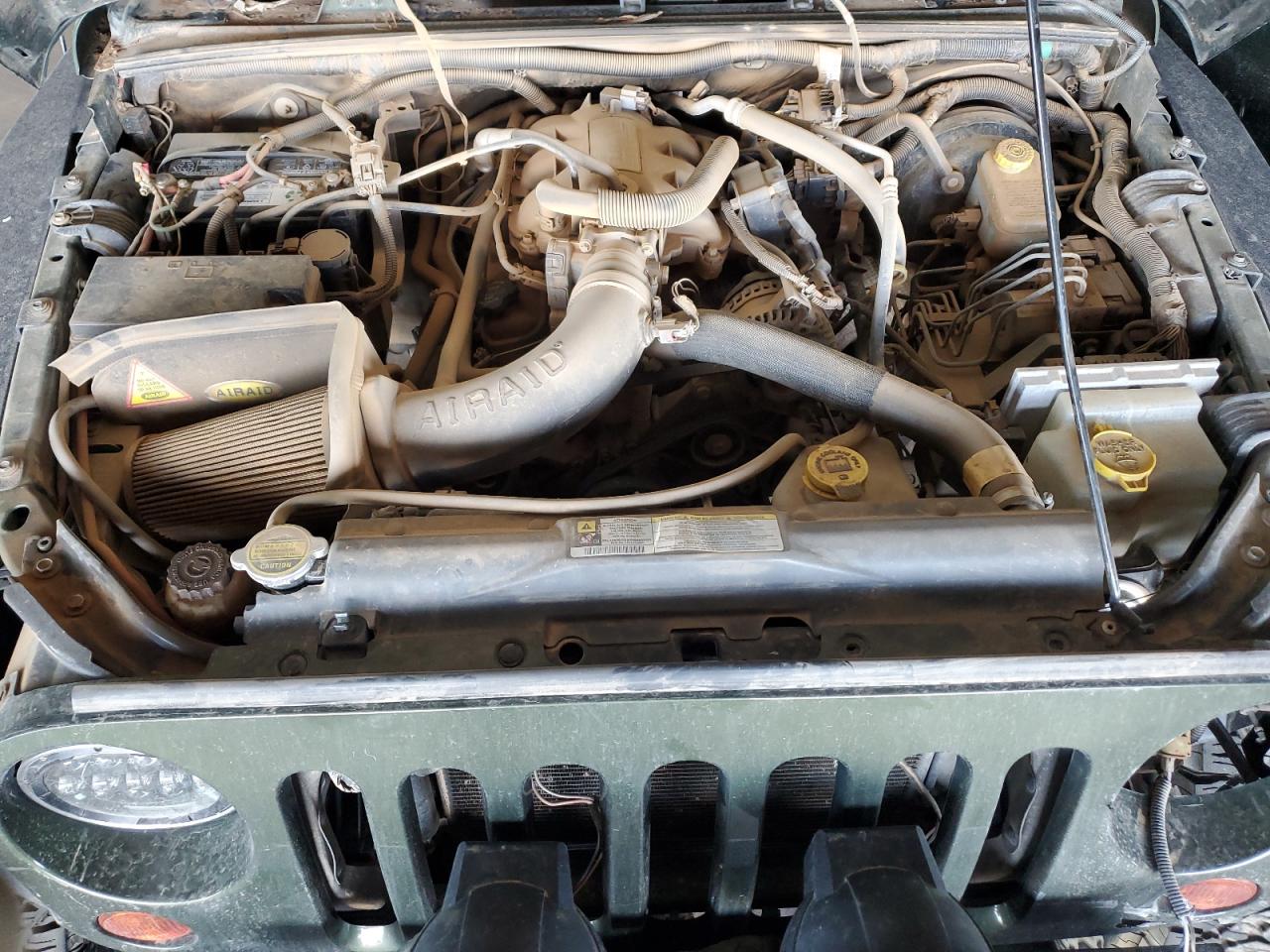 2009 Jeep Wrangler VIN 1J4GA39119L740011 Copart auction photo, side / front end damage thumbnail 11