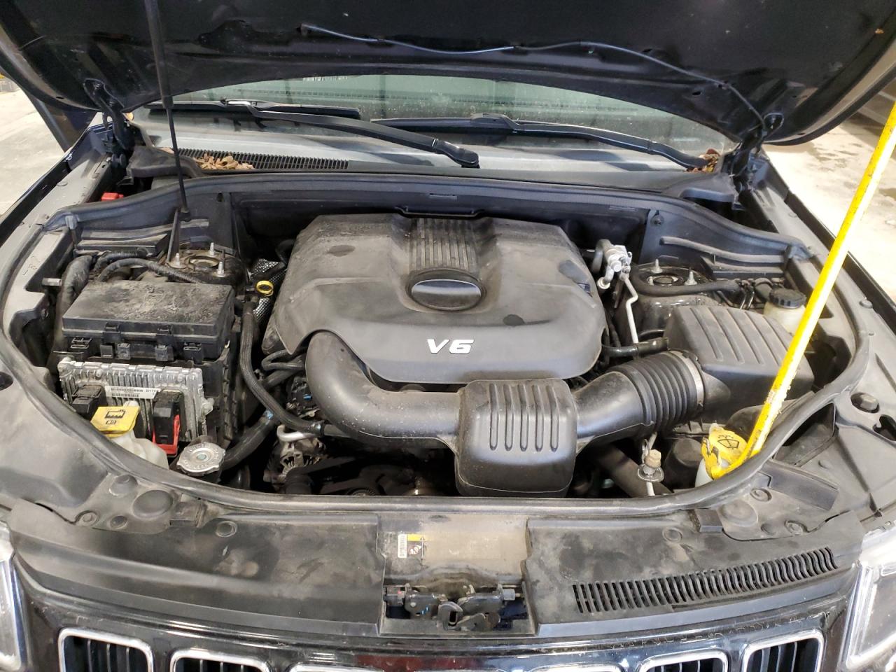 2015 Jeep Grand Cherokee VIN 1C4RJFBG5FC679398 Copart auction photo, side damage thumbnail 12