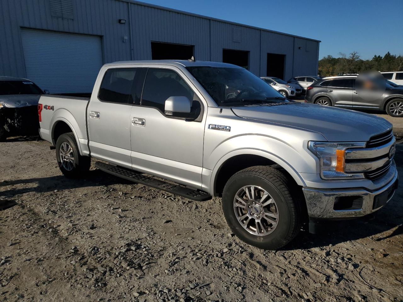 2019 Ford F-150 VIN 1FTEW1E57KFB48970 Copart auction photo, side / front end damage thumbnail 4