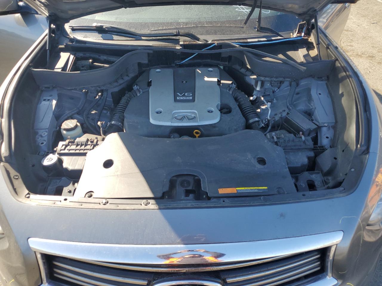 2014 Infiniti QX70 VIN JN8CS1MW2EM413392 Copart auction photo, vandalism / minor dent/scratches damage thumbnail 12
