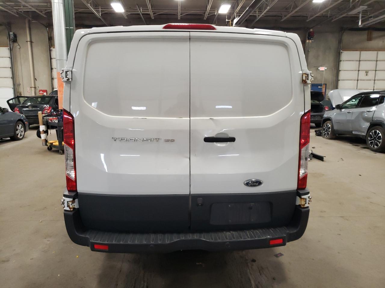 2015 Ford Transit VIN 1FTYE1ZM3FKA96574 Copart auction photo, mechanical damage thumbnail 6
