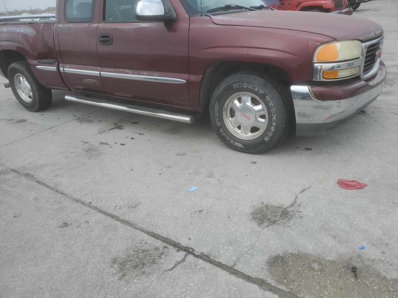 1999 GMC Sierra VIN 2GTEC19V1X1545804 Copart auction photo, side damage thumbnail 4