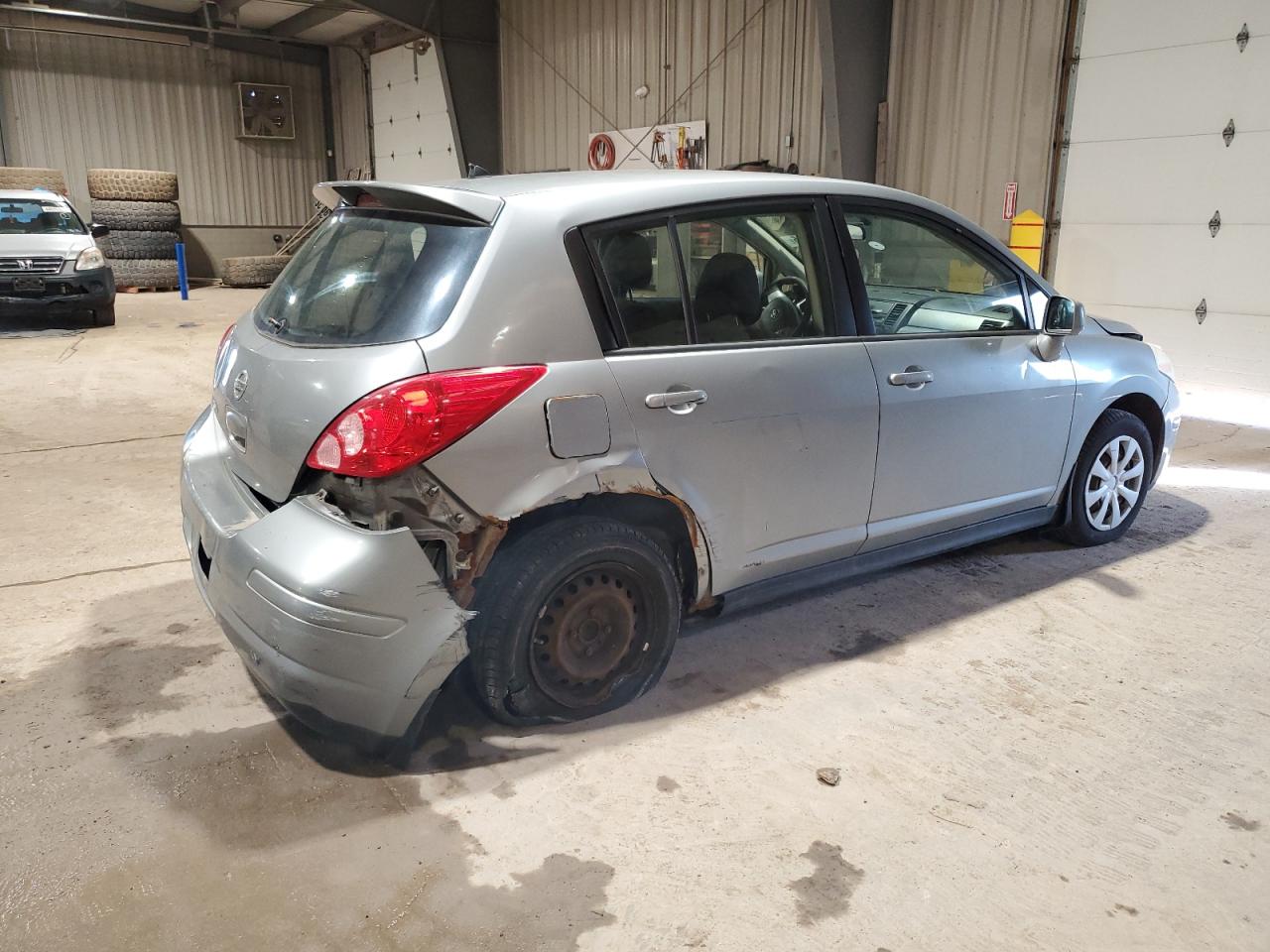 2009 Nissan Versa VIN 3N1BC13EX9L486641 Copart auction photo, rear end / front end damage thumbnail 3