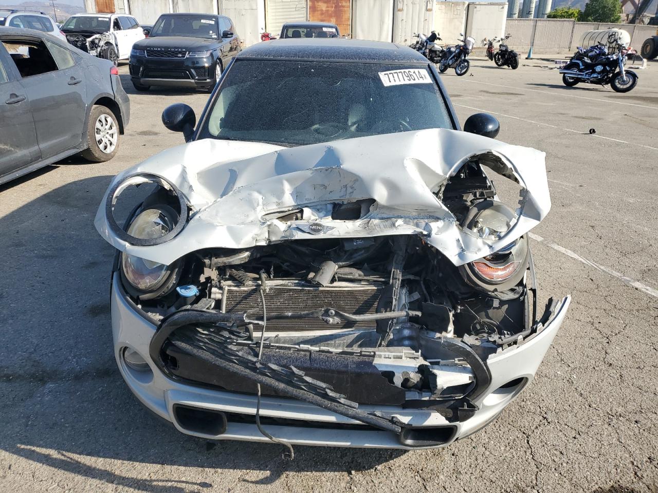 2017 MINI Cooper VIN WMWXP7C36H3B94634 Copart auction photo, front end / minor dent/scratches damage thumbnail 5